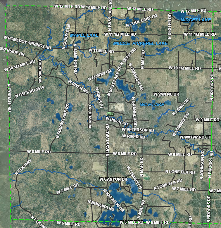 Detailed road map with lakes and coordinates.